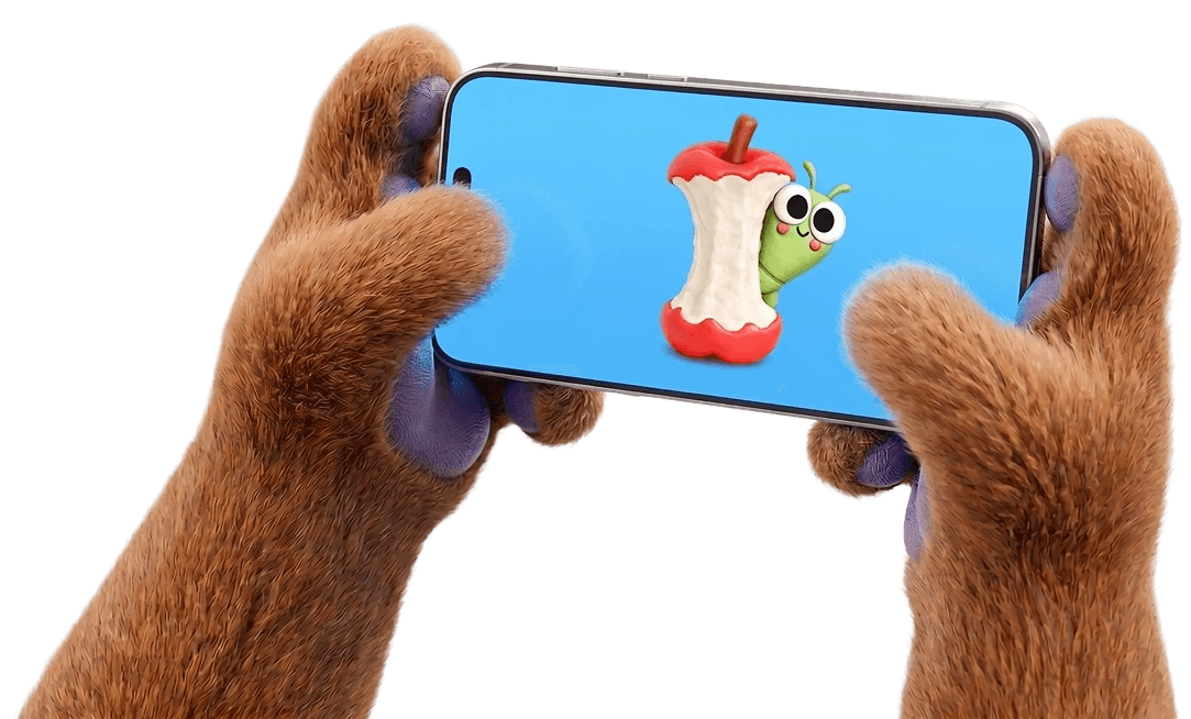 Furry paws holding a phone showing a Maka Kids character
